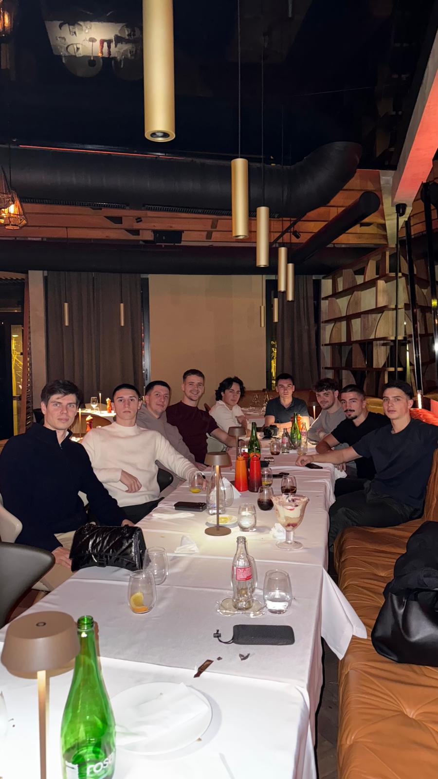 Helix founder community members at a long dinner table in Belgrade Helix founder community members at a long dinner table in Belgrade