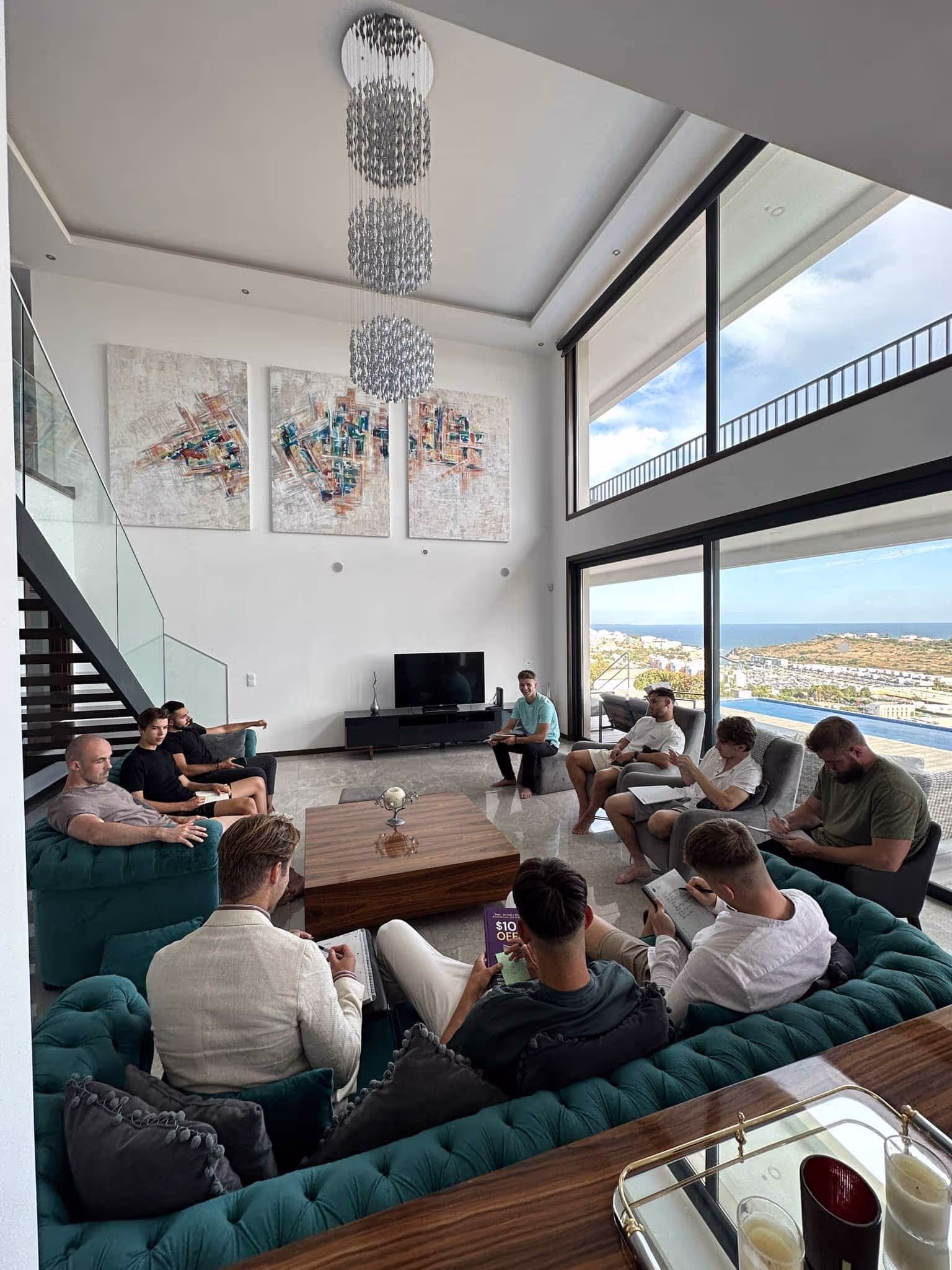 Helix founders in a peer session in a Cape Town villa living room