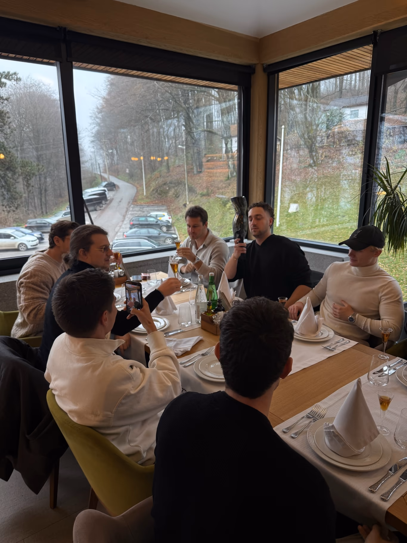 Founder community — the table everyone shows up for Helix founders laughing around a long dinner table — a founder community that actually convenes