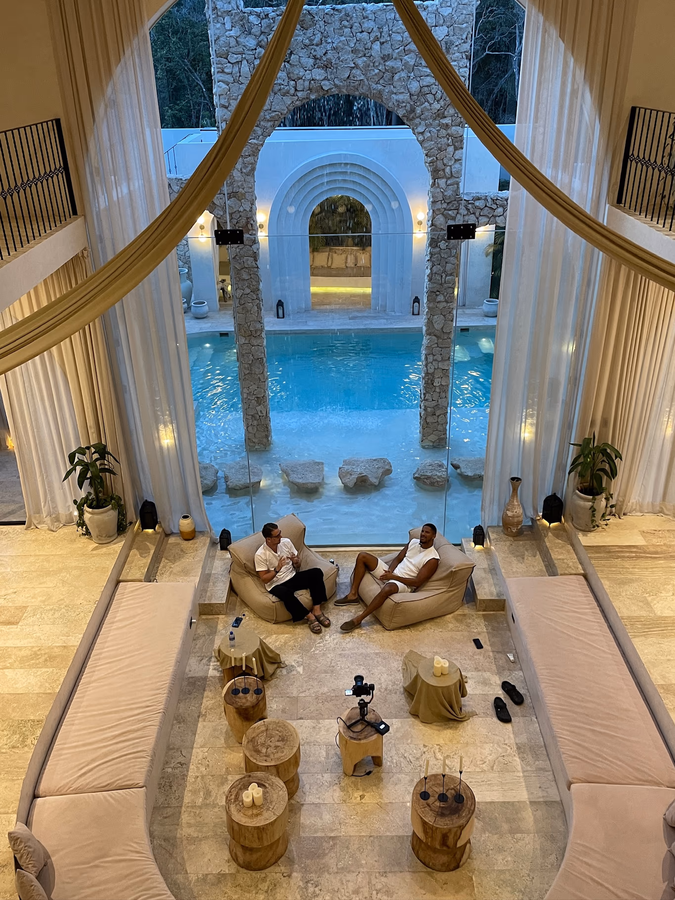 Founders at a poolside villa during a Helix retreat — work and recovery in one place